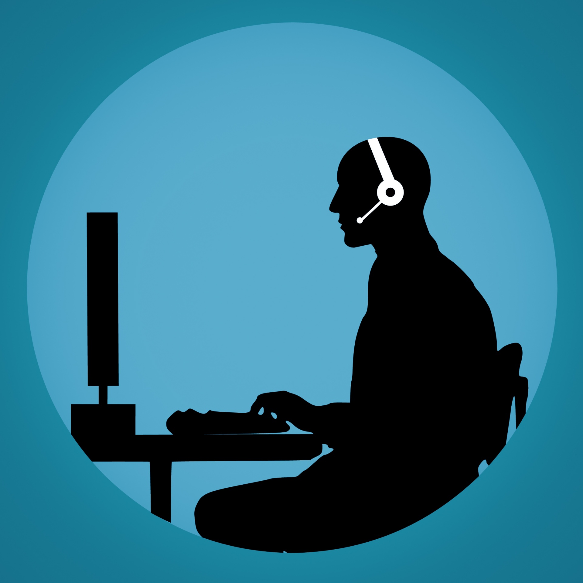 Black on blue icon of male customer support person sitting at a desk with keyboard, monitor and white headset