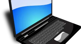 PC laptop open with blue screen, side angle view